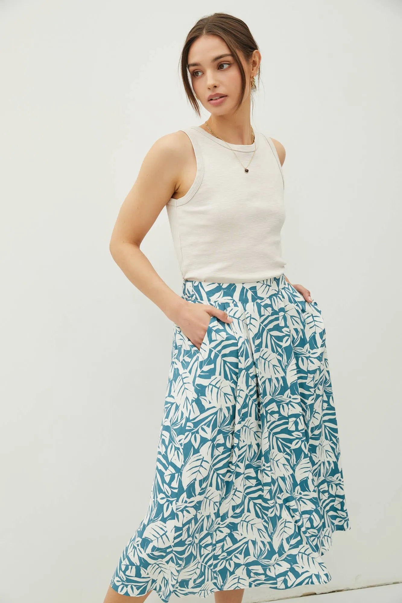 TROPICAL PRINT HIGH RISE PINTUCKED MIDI SKIRT